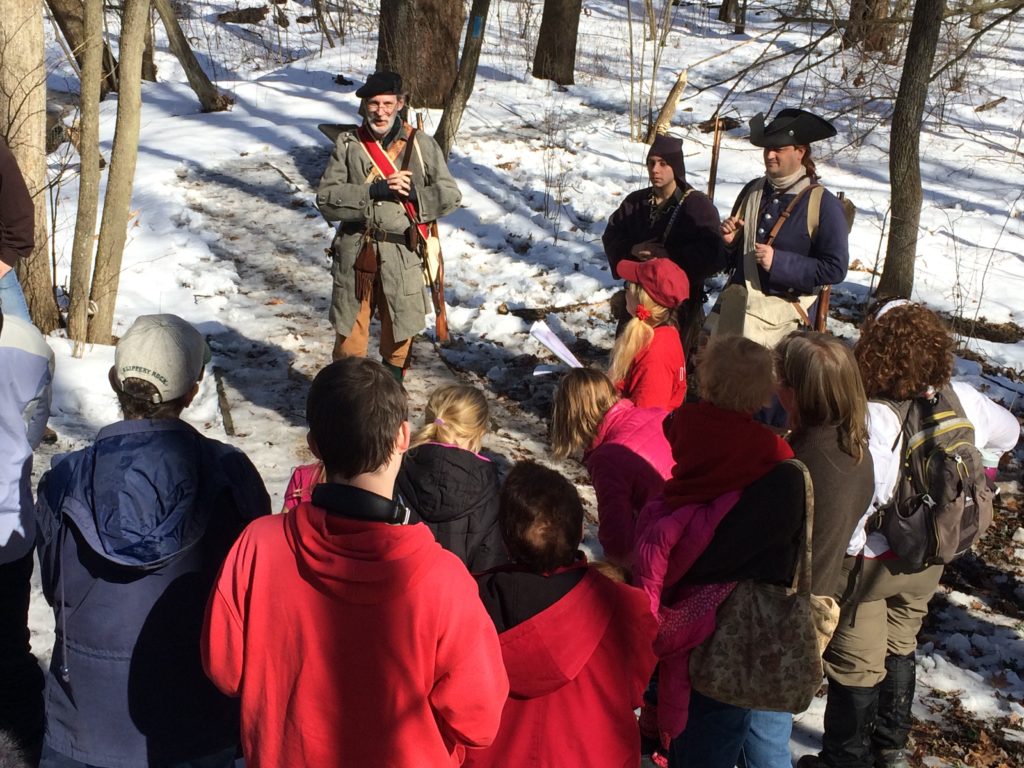 Bob Shaner of Leechburg, Pa., portraying frontier guide Christopher Gist, talks to hikers about the musket shot that almost killed 21-year-old George Washington when he traveled through western Pennsylvania in 1753. Similar reenactments will happen during history hikes scheduled for Feb. 22 at Jennings Environmental Education Center near Slippery Rock.