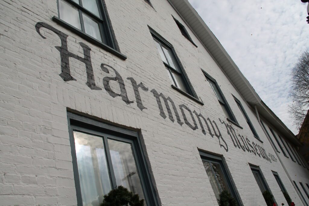 A building with the words " harmony house ".