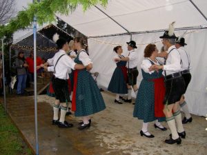 A group of people in traditional bavarian clothing.